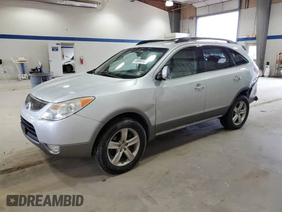 2010 Hyundai Veracruz Limited with VIN KM8NUDCC9AU133286, listed as a Copart auction lot 68998105 with 156,429 mi miles and Salvage title. Bid and sale history available at DreamBid. Image 1.