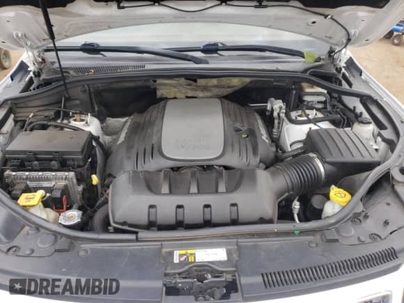 2015 Jeep Grand Cherokee Summit с VIN 1C4RJFJT9FC794584, выставлен на аукционе Copart как лот 61525144 с пробегом 116 484 миль миль и Списание • Salvage title. История ставок и продаж доступна на DreamBid. Изображение 12.