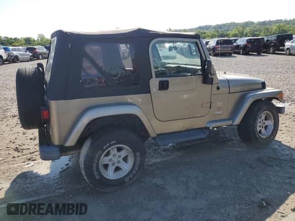 2004 Jeep Wrangler Sahara с VIN 1J4FA59S14P755450, выставлен на аукционе Copart как лот 58558005 с пробегом 194 044 миль миль и Списание • Salvage title. История ставок и продаж доступна на DreamBid. Изображение 3.