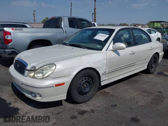 2002 Hyundai Sonata GLS z VIN KMHWF35H12A541379, wystawiony jako IAAI lot #42736860 z przebiegiem 190 682 mil mil oraz . Historia ofert i sprzedaży dostępna na DreamBid. Obrazek 6.