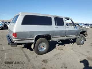 1989 Chevrolet Suburban с VIN 1GNGV26K8KF128711, выставлен на аукционе Copart как лот 46658895 с пробегом Не указан миль и Списание • Salvage title. История ставок и продаж доступна на DreamBid. Изображение 3.