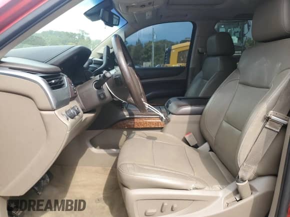 2015 Chevrolet Suburban LTZ с VIN 1GNSKKKC1FR137921, выставлен на аукционе Copart как лот 70644505 с пробегом 218 182 миль миль и Списание • Salvage title. История ставок и продаж доступна на DreamBid. Изображение 7.