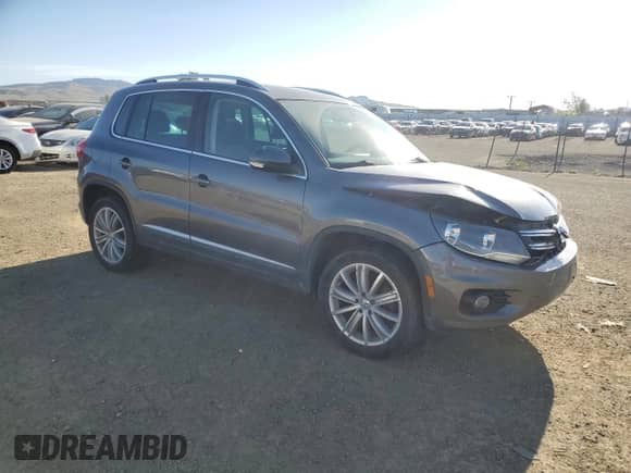 2014 Volkswagen Tiguan SEL z VIN WVGAV3AX0EW555873, wystawiony jako Copart lot #55695955 z przebiegiem 69 984 mil mil oraz Szkoda całkowita • Salvage title. Historia ofert i sprzedaży dostępna na DreamBid. Obrazek 4.