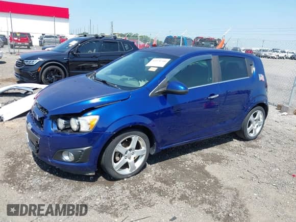 2014 Chevrolet Sonic LTZ with VIN 1G1JE6SBXE4202876, listed as a IAAI auction lot 42470700 with 155,689 mi miles and . Bid and sale history available at DreamBid. Image 2.