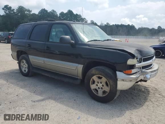 2004 Chevrolet Tahoe LT с VIN 1GNEC13Z24R207897, выставлен на аукционе Copart как лот 69445485 с пробегом 205 375 миль миль и Списание • Salvage title. История ставок и продаж доступна на DreamBid. Изображение 4.