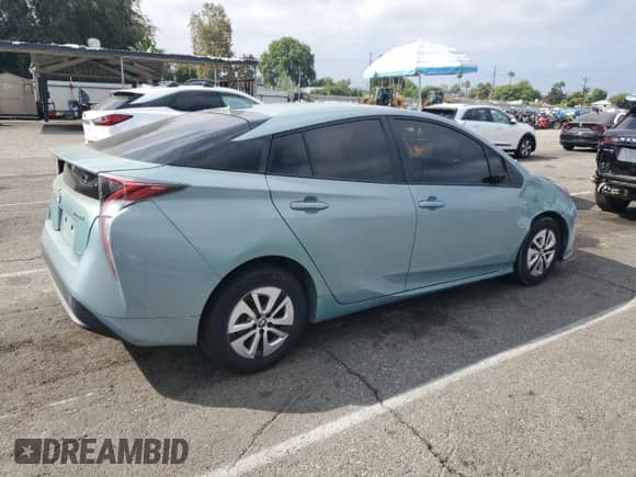 2016 Toyota Prius Three Touring z VIN JTDKARFUXG3511762, wystawiony jako Copart lot #80339845 z przebiegiem 104 835 mil mil oraz Szkoda całkowita • Salvage title. Historia ofert i sprzedaży dostępna na DreamBid. Obrazek 3.
