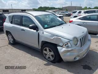 2007 Jeep Compass Sport with VIN 1J8FT47W87D358252, listed as a IAAI auction lot 42442373 with 180,184 mi miles and . Bid and sale history available at DreamBid. Image 1.