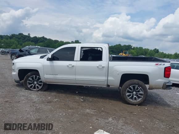 2016 Chevrolet Silverado 1500 LT with VIN 3GCUKREC4GG363667, listed as a IAAI auction lot 42617337 with 149,385 mi miles and . Bid and sale history available at DreamBid. Image 14.