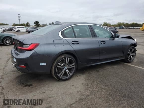 2021 BMW 3 Series 330e xDrive z VIN 3MW5P9J02M8B64508, wystawiony jako Copart lot #73336224 z przebiegiem 28 822 mil mil oraz Szkoda całkowita • Salvage title. Historia ofert i sprzedaży dostępna na DreamBid. Obrazek 3.