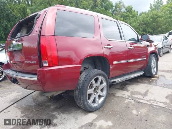 2010 Cadillac Escalade Luxury with VIN 1GYUKBEF2AR137842, listed as a IAAI auction lot 42759491 with 314,422 mi miles and . Bid and sale history available at DreamBid. Image 4.