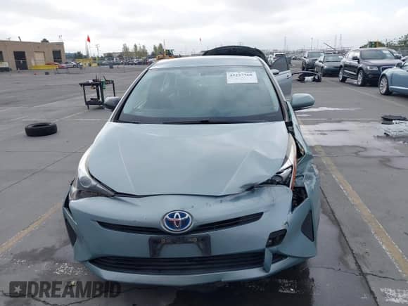 2016 Toyota Prius Two with VIN JTDKBRFU8G3506850, listed as a IAAI auction lot 43257568 with 130,206 mi miles and . Bid and sale history available at DreamBid. Image 12.