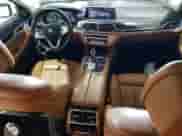 2017 BMW 7 Series 740e xDrive with VIN WBA7J2C38HG497960, listed as a Copart auction lot 58901035 with 128,262 mi miles and Salvage title. Bid and sale history available at DreamBid. Image 8.
