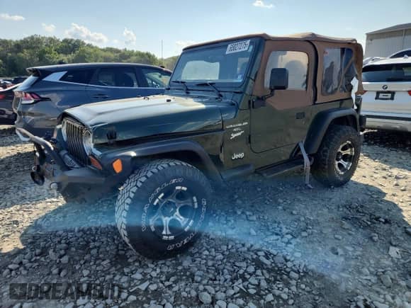 1997 Jeep Wrangler Sport with VIN 1J4FY19S0VP430844, listed as a Copart auction lot 65827275 with 91,868 mi miles and Salvage title. Bid and sale history available at DreamBid. Image 1.