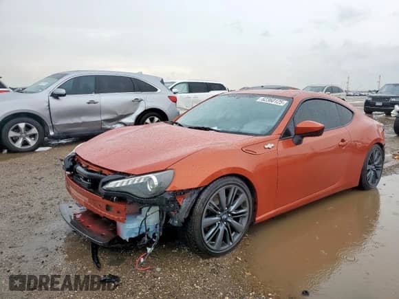 2015 Scion FR-S z VIN JF1ZNAA18F8702136, wystawiony jako Copart lot #62360125 z przebiegiem 106 637 mil mil oraz Szkoda całkowita • Salvage title. Historia ofert i sprzedaży dostępna na DreamBid. Obrazek 1.