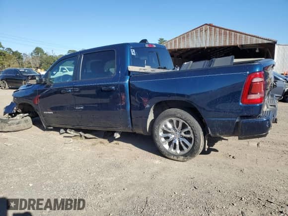 2023 Ram 1500 Laramie z VIN 1C6RREJT0PN607944, wystawiony jako Copart lot #87011034 z przebiegiem 50 822 mil mil oraz Szkoda całkowita • Salvage title. Historia ofert i sprzedaży dostępna na DreamBid. Obrazek 2.