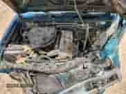 1997 Nissan Frontier XE with VIN 1N6SD11S5VC336667, listed as a Copart auction lot 64675695 with 179,754 mi miles and Salvage title. Bid and sale history available at DreamBid. Image 11.