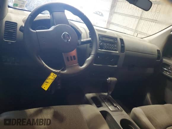 2007 Nissan Frontier SE z VIN 1N6AD07U77C426727, wystawiony jako Copart lot #69798645 z przebiegiem 89 041 mil mil oraz Szkoda całkowita • Salvage title. Historia ofert i sprzedaży dostępna na DreamBid. Obrazek 8.