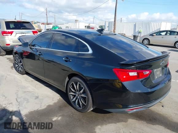 2020 Chevrolet Malibu RS with VIN 1G1ZG5STXLF135018, listed as a IAAI auction lot 43195958 with 94,145 mi miles and . Bid and sale history available at DreamBid. Image 3.