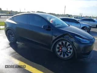 2022 Tesla Model Y Performance with VIN 7SAYGDEF3NF534723, listed as a IAAI auction lot 43365292 with 31,159 mi miles and . Bid and sale history available at DreamBid. Image 1.