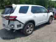 2024 Honda Pilot EX-L with VIN 5FNYG2H55RB008152, listed as a IAAI auction lot 42651116 with 19,679 mi miles and . Bid and sale history available at DreamBid. Image 4.