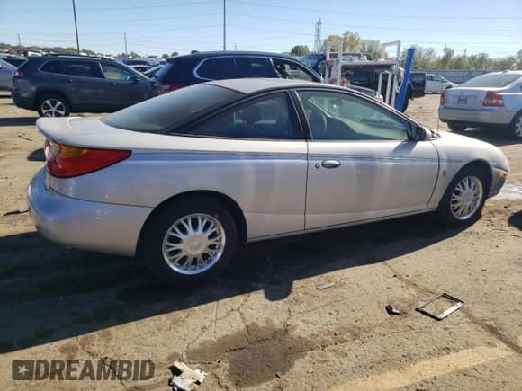 2001 Saturn SC с VIN 1G8ZY14751Z338353, выставлен на аукционе Copart как лот 75086154 с пробегом 100 044 миль миль и Чистый • Clean title. История ставок и продаж доступна на DreamBid. Изображение 3.