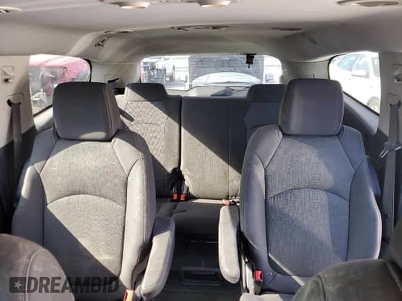 2016 Chevrolet Traverse LT z VIN 1GNKVHKD3GJ264818, wystawiony jako Copart lot #70047355 z przebiegiem 216 024 mil mil oraz Szkoda całkowita • Salvage title. Historia ofert i sprzedaży dostępna na DreamBid. Obrazek 10.