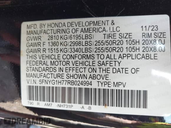 2024 Honda Pilot Touring with VIN 5FNYG1H77RB024994, listed as a IAAI auction lot 42672752 with 23,740 mi miles and . Bid and sale history available at DreamBid. Image 9.