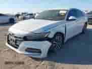 2018 Honda Accord with VIN 1HGCV3F10JA003848, listed as a IAAI auction lot 43435031 with 163,085 mi miles and . Bid and sale history available at DreamBid. Image 6.