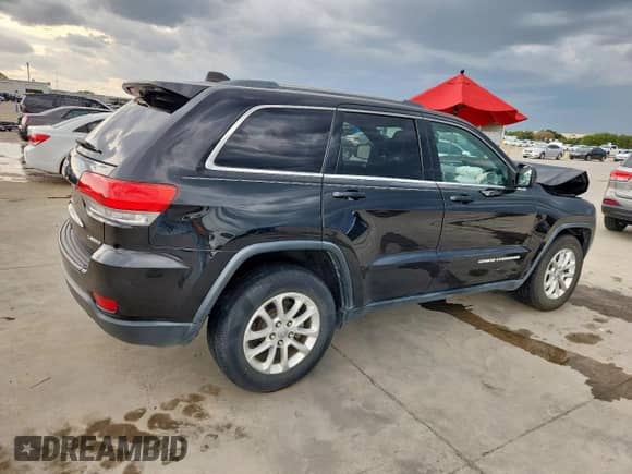 2014 Jeep Grand Cherokee Laredo с VIN 1C4RJEAGXEC145629, выставлен на аукционе Copart как лот 70733045 с пробегом 125 145 миль миль и Списание • Salvage title. История ставок и продаж доступна на DreamBid. Изображение 3.