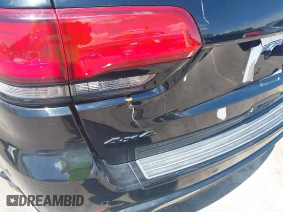 2017 Jeep Grand Cherokee Altitude with VIN 1C4RJFAG4HC927399, listed as a IAAI auction lot 42860731 with 103,692 mi miles and . Bid and sale history available at DreamBid. Image 20.