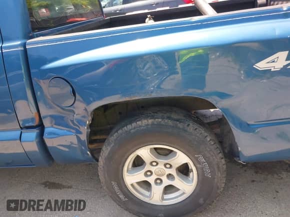 2005 Dodge Dakota SLT with VIN 1D7HW48N25S112499, listed as a IAAI auction lot 42434700 with 216,817 mi miles and . Bid and sale history available at DreamBid. Image 22.