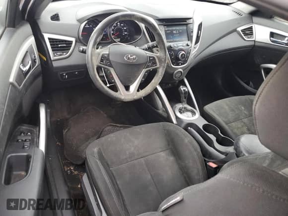 2014 Hyundai Veloster z VIN KMHTC6AD8EU196161, wystawiony jako Copart lot #82244385 z przebiegiem 146 717 mil mil oraz Czysty tytuł • Clean title. Historia ofert i sprzedaży dostępna na DreamBid. Obrazek 8.