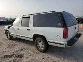 1996 Chevrolet Suburban с VIN 1GNEC16RXTJ391298, выставлен на аукционе Copart как лот 65437144 с пробегом 155 063 миль миль и Списание • Salvage title. История ставок и продаж доступна на DreamBid. Изображение 2.