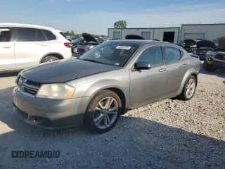2012 Dodge Avenger SXT Plus with VIN 1C3CDZEG6CN111918, listed as a Copart auction lot 63690995 with 168,086 mi miles and Salvage title. Bid and sale history available at DreamBid. Image 1.