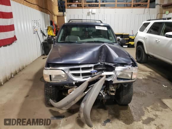 1999 Ford Explorer Sport с VIN 1FMYU24E5XUC26073, выставлен на аукционе Copart как лот 86696925 с пробегом 179 188 миль миль и На запчасти • Non repairable. История ставок и продаж доступна на DreamBid. Изображение 5.