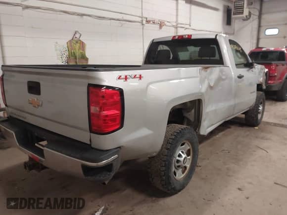 2015 Chevrolet Silverado 2500HD Work Truck with VIN 1GC0KUEG8FZ109107, listed as a IAAI auction lot 41208008 with 161,539 mi miles and . Bid and sale history available at DreamBid. Image 4.