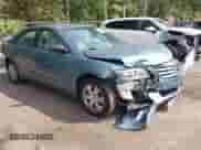 2010 Toyota Camry LE with VIN 4T1BF3EK0AU523365, listed as a IAAI auction lot 43285077 with 122,884 mi miles and . Bid and sale history available at DreamBid. Image 1.