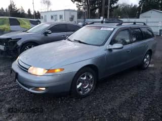 2002 Saturn LW with VIN 1G8JW84R22Y556738, listed as a Copart auction lot 86540174 with Not provided miles and Salvage title. Bid and sale history available at DreamBid. Image 1.