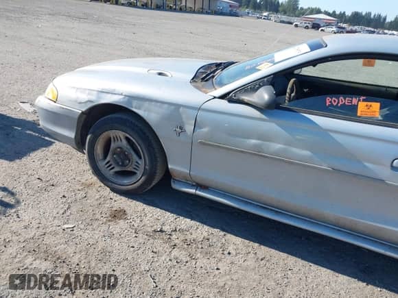 1994 Ford Mustang z VIN 1FALP4041RF171911, wystawiony jako IAAI lot #42705975 z przebiegiem 292 952 mil mil oraz . Historia ofert i sprzedaży dostępna na DreamBid. Obrazek 15.