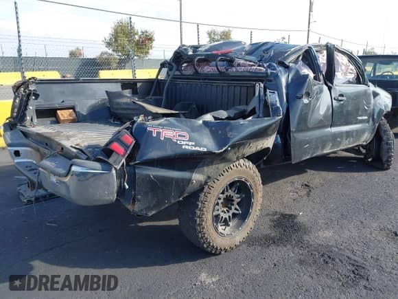 2009 Toyota Tacoma with VIN 5TELU42NX9Z655359, listed as a IAAI auction lot 43443670 with 198,250 mi miles and . Bid and sale history available at DreamBid. Image 4.