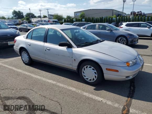 2000 Saturn SL with VIN 1G8ZK5279YZ252761, listed as a Copart auction lot 63204475 with 80,646 mi miles and Clean title. Bid and sale history available at DreamBid. Image 4.