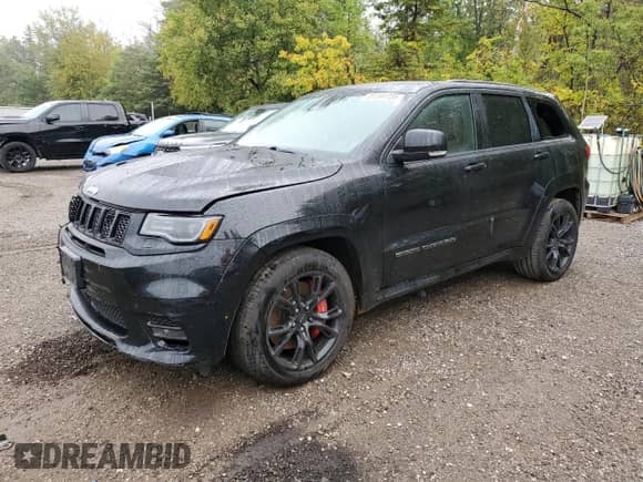 2017 Jeep Grand Cherokee SRT с VIN 1C4RJFDJ5HC723301, выставлен на аукционе Copart как лот 81391735 с пробегом 127 835 миль миль и На запчасти • Non repairable. История ставок и продаж доступна на DreamBid. Изображение 1.