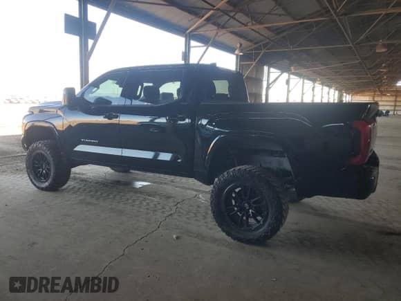 2023 Toyota Tundra SR5 with VIN 5TFLA5DB0PX064186, listed as a Copart auction lot 90465975 with 27,663 mi miles and Salvage title. Bid and sale history available at DreamBid. Image 2.