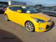 2012 Hyundai Veloster w/Black Int z VIN KMHTC6AD9CU066984, wystawiony jako IAAI lot #43489204 z przebiegiem 180 317 mil mil oraz . Historia ofert i sprzedaży dostępna na DreamBid. Obrazek 1.