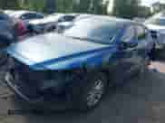 2023 Mazda CX-5 S Preferred z VIN JM3KFBCM3P0255230, wystawiony jako IAAI lot #42420823 z przebiegiem 69 331 mil mil oraz . Historia ofert i sprzedaży dostępna na DreamBid. Obrazek 2.