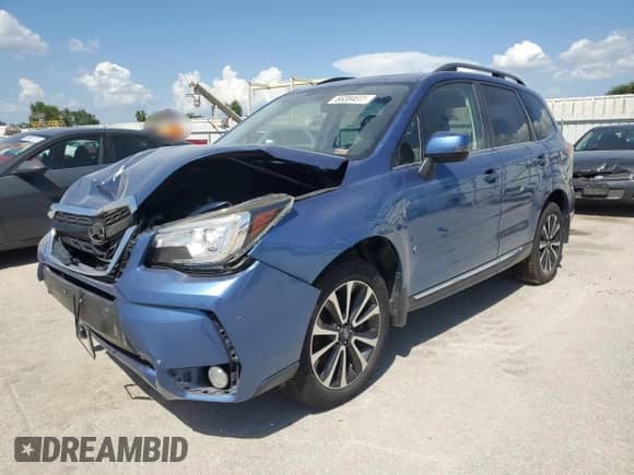 2017 Subaru Forester Touring z VIN JF2SJGWC0HH484234, wystawiony jako Copart lot #66384665 z przebiegiem 146 276 mil mil oraz Szkoda całkowita • Salvage title. Historia ofert i sprzedaży dostępna na DreamBid. Obrazek 1.