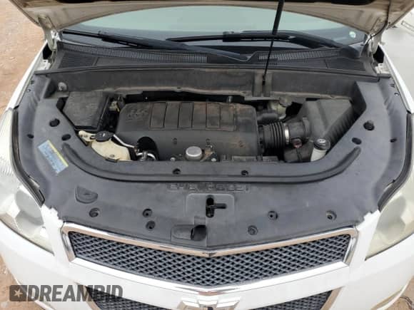 2010 Chevrolet Traverse 1LT с VIN 1GNLRFED2AS145152, выставлен на аукционе Copart как лот 70765415 с пробегом 174 790 миль миль и Списание • Salvage title. История ставок и продаж доступна на DreamBid. Изображение 12.