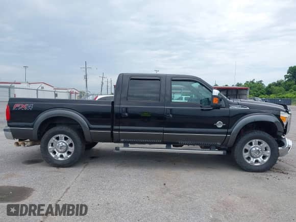 2016 Ford F-250 Lariat z VIN 1FT7W2BT3GEB66672, wystawiony jako IAAI lot #42201673 z przebiegiem 131 572 mil mil oraz . Historia ofert i sprzedaży dostępna na DreamBid. Obrazek 13.