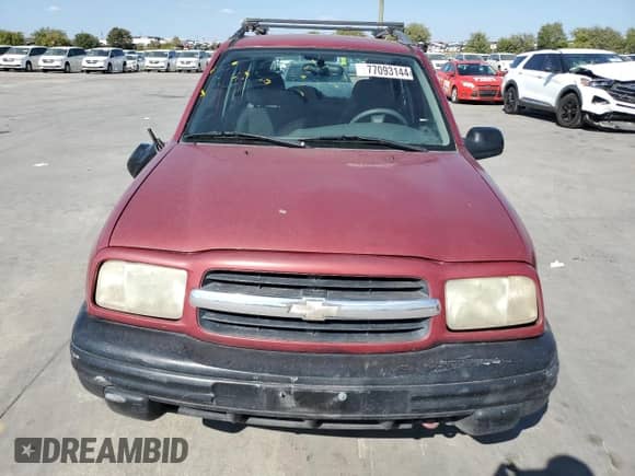 2001 Chevrolet Tracker with VIN 2CNBE13C816917150, listed as a Copart auction lot 77093144 with Not provided miles and Salvage title. Bid and sale history available at DreamBid. Image 5.