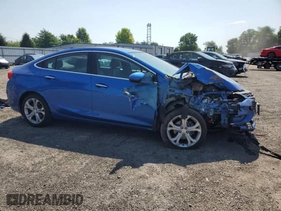 2017 Chevrolet Cruze Premier z VIN 1G1BF5SM1H7168844, wystawiony jako Copart lot #63966555 z przebiegiem 138 445 mil mil oraz Szkoda całkowita • Salvage title. Historia ofert i sprzedaży dostępna na DreamBid. Obrazek 4.